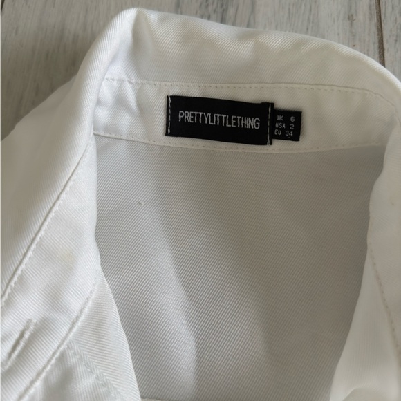 PrettyLittleThing White Long Sleeve Dress with Black Button Accents - Picture 12 of 12